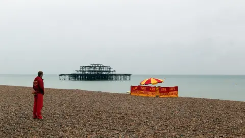 Julian Herbert/Getty Images Lifeguard on Brighton beach