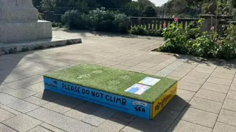 Empty plinth after a statue was stolen