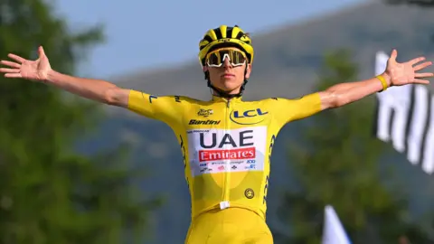 Tadej Pogacar celebrates winning a stage at the 2024 Tour de France