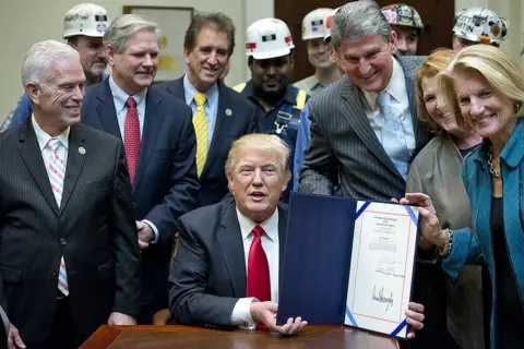 Getty Images Donald Trump signs mining order