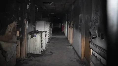 A burnt out hospital ward.