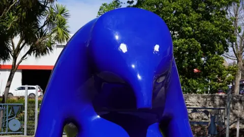 City of Mount Gambier A large blue sculpture with two white spots on its head 
