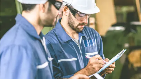 Getty Images Industry workers