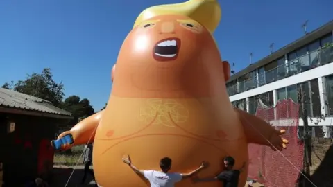 Reuters an inflated Donald Trump blimp