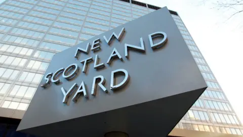 PA Media New Scotland Yard