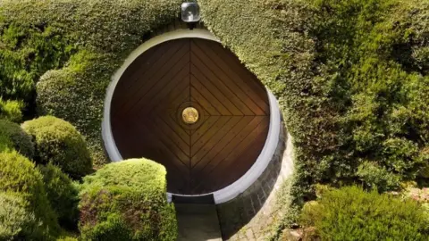 James O Davies/Historic England Hobbit door