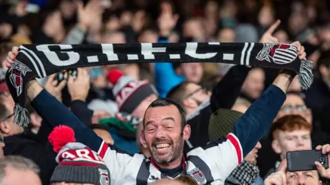 Sebastian Frej/MB Media/Getty Images Grimsby fans