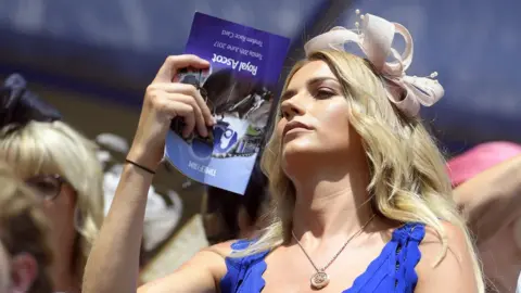 Getty Images Woman fans herself