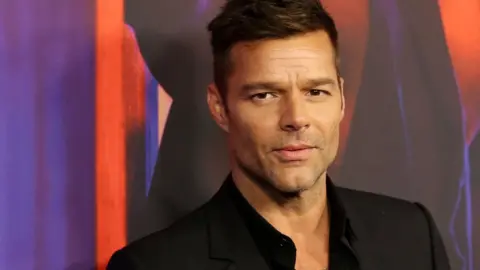 Ricky Martin says he forced partners 'back into the closet'