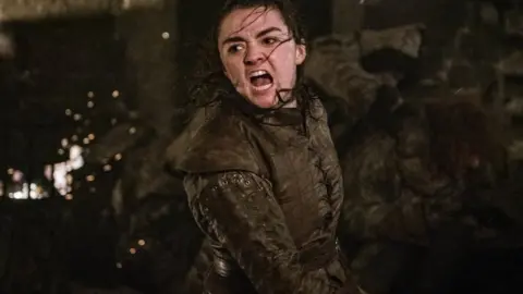 Helen Sloan/HBO Maisie Williams as Arya Stark in Game of Thrones