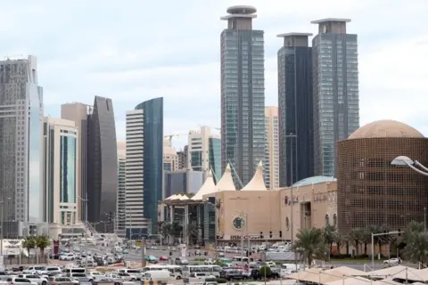 AFP/Getty Images This photo taken on 24 November, 2015 shows skyscrapers in the Qatari capital Doha.