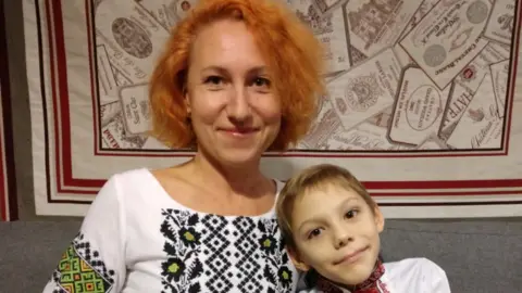Tracey Gemmell Liuba, with her son Grisha
