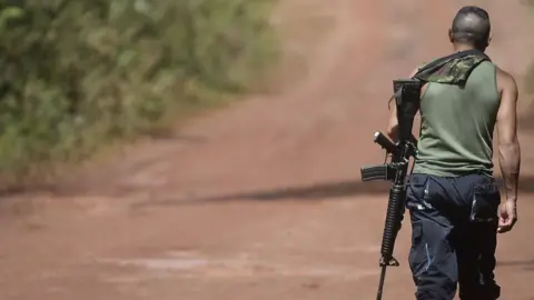 Getty Images Farc rebel with gun