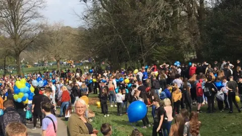 Crowds gather at the vigil