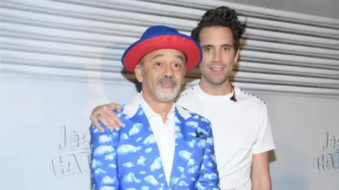 Getty Images Christian Louboutin and Mika