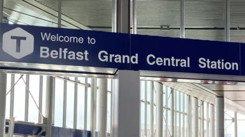 PA Media A sign saying 'Welcome to Belfast Grand Central Station'