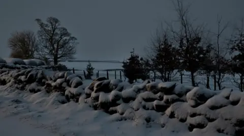 BBC Weather Watchers/Lucy Kidwell A snowy field in Colne, Lancashire