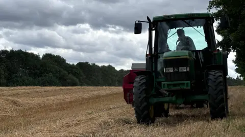 Tractor in field