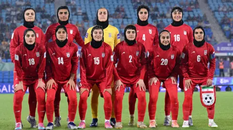 Reuters Iran players pose prior to the AFC Women’s Asian Cup Group A match between Iran and Philippines at Gold Coast Stadium on the Gold Coast, Australia, March 8, 2026. 
