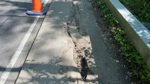 National Highways Deep crack on a pavement