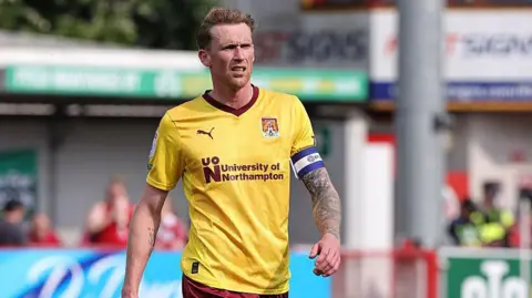 Mitch Pinnock in action for Northampton Town