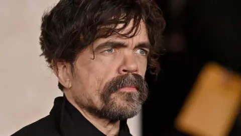 Getty Images Peter Dinklage participará "Juegos del hambre: Songbird y Snake Ballad" Estreno de Los Ángeles en el TCL Chinese Theatre, celebrado en Hollywood, California, el 13 de noviembre de 2023