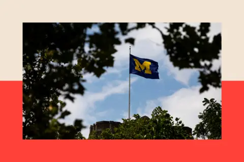 Emily Elconin/Bloomberg via Getty Images A University of Michigan flag on the Michigan Union building
