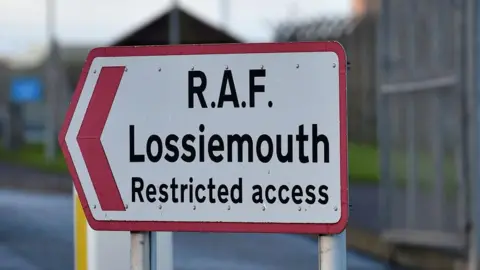 Getty Images A sign that says RAF Lossiemouth - restricted access.