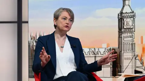BBC Yvette Cooper wearing a dark suit sitting in the Sunday with Laura Kuenssberg studio 