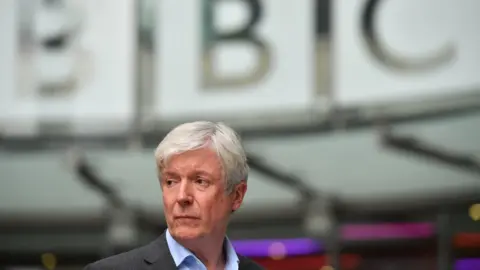 AFP/Getty The BBC's Director General Lord Hall says global media giants have created new definitions of market scale.