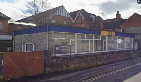 Google Maps Grey brick building which says 'Warminster Prep'