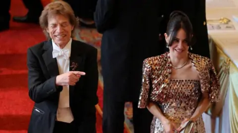 Reuters Sir Mick Jagger with Melanie Hamrick at the state banquet