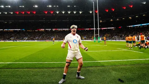 Ben Whitley/PA Wire England's Henry Pollock celebrates at full time following the Quilter Nations Series match at the Allianz Stadium Twickenham, London, December 2025.