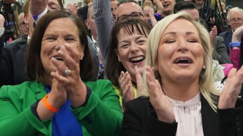 Mary-Lou McDonald and Michelle O'Neill cheering