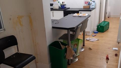 Youth club room vandalised with egg yolk on the walls, rubbish from bins thrown on the floor
