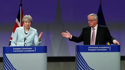 Reuters Theresa May and European Commission President Jean-Claude Juncker