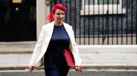 PA Media Louise Haigh leaving Downing Street carrying a red folder