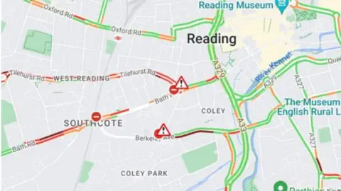 Reading burst water main sees roads closed by flooding