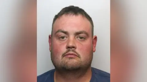 South Yorkshire Police A mug shot of Jordan Teal