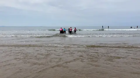 Surfers in the water