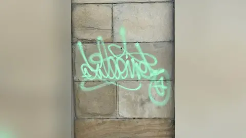  Fans Museum Sunderland Green graffiti on the stone wall of the museum building