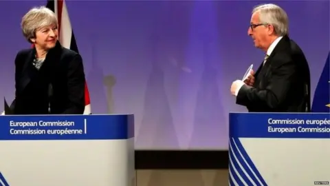 Reuters Theresa May with European Commission President Jean-Claude Juncker