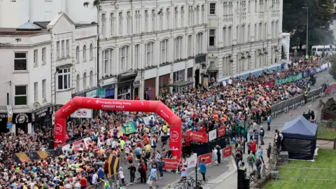 RUN 4 WALES Runners get ready to set off at on Cardiff's Castle Street