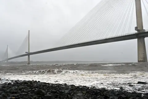 Getty The Queensferry Crossing from Fife under very grey skies and with a broiling, grey Firth of Forth underneath.