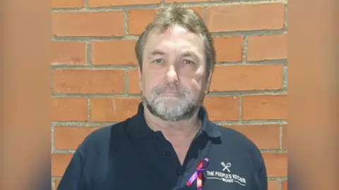 BBC Damien McNairney looks at camera