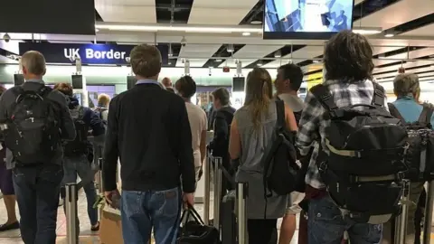 BBC Passengers at Heathrow airport