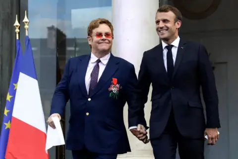 Getty Images Elton John and Emmanuel Macron