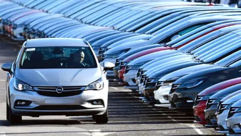 AFP VIA GETTY IMAGES Vauxhall cars at Ellesmere Port plant