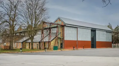 Bicester Motion Wide shot of a hangar site at Bicester Motion.