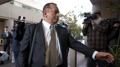 Getty Images Sunny Balwani enters the courthouse